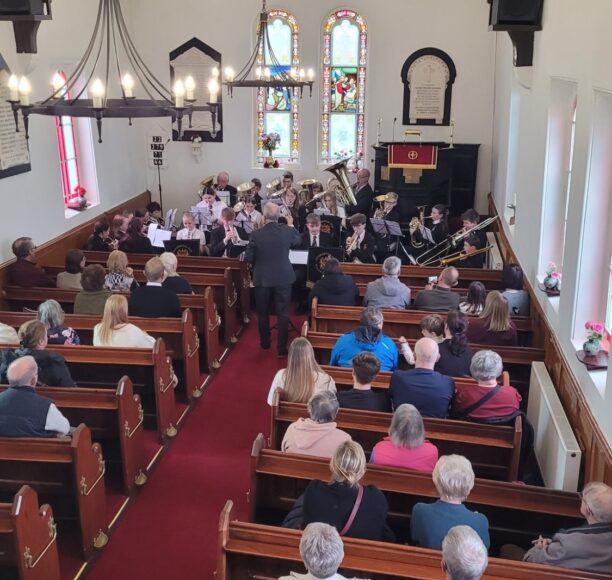 The congregation/audience and Pemberton Youth Brass Band