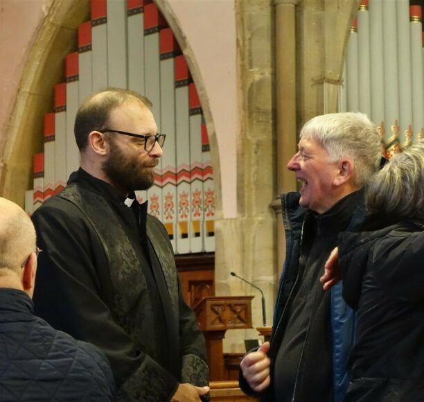 Rev. Rob speaks to Padiham Congregation Member John Lupton