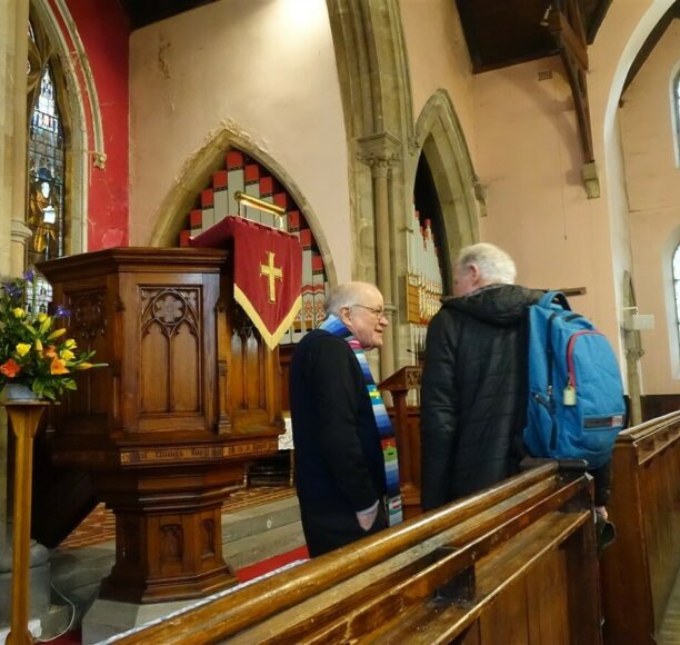 Rev. Jim Corrigall speaks to Prof. Geoff Levermore GA President